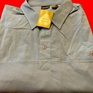 Men’s Thompson Shirtmaker’s blue short sleeve shirt w/knit band on the bottom 4x